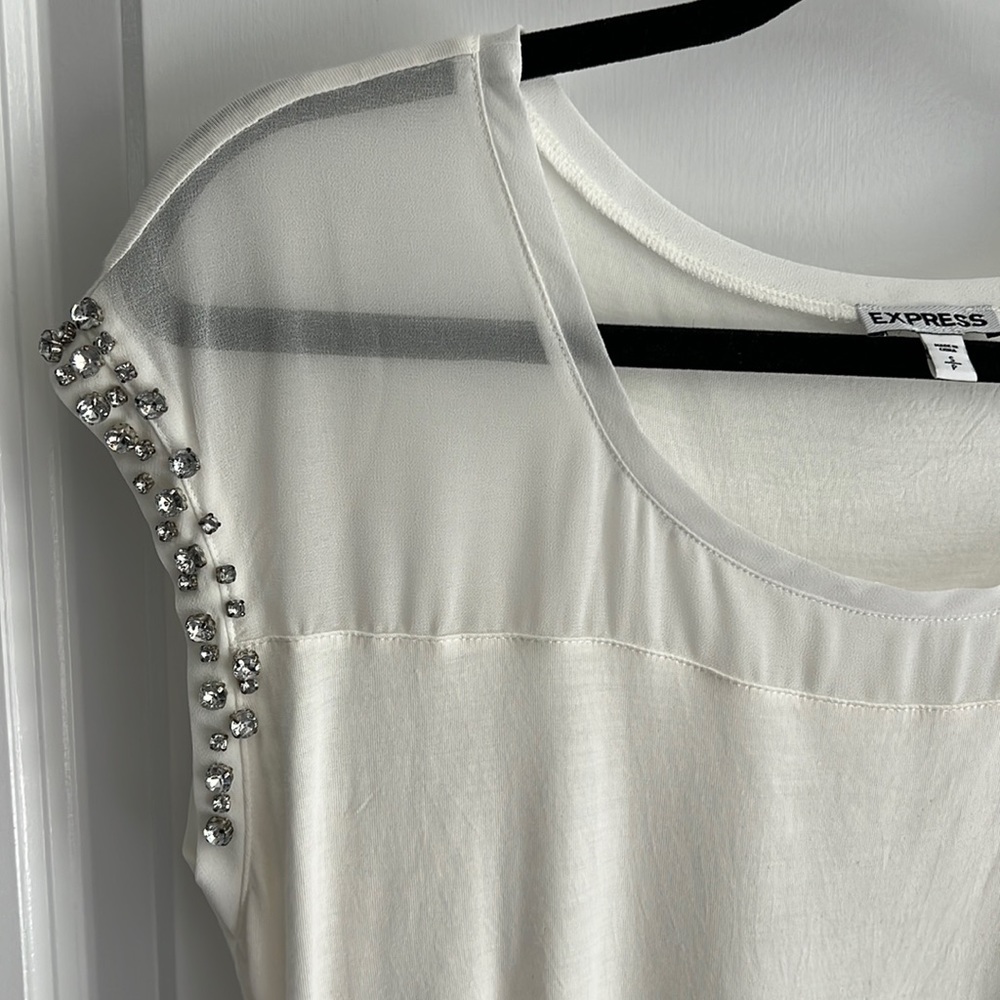Express size small ivory short sleeve blouse.